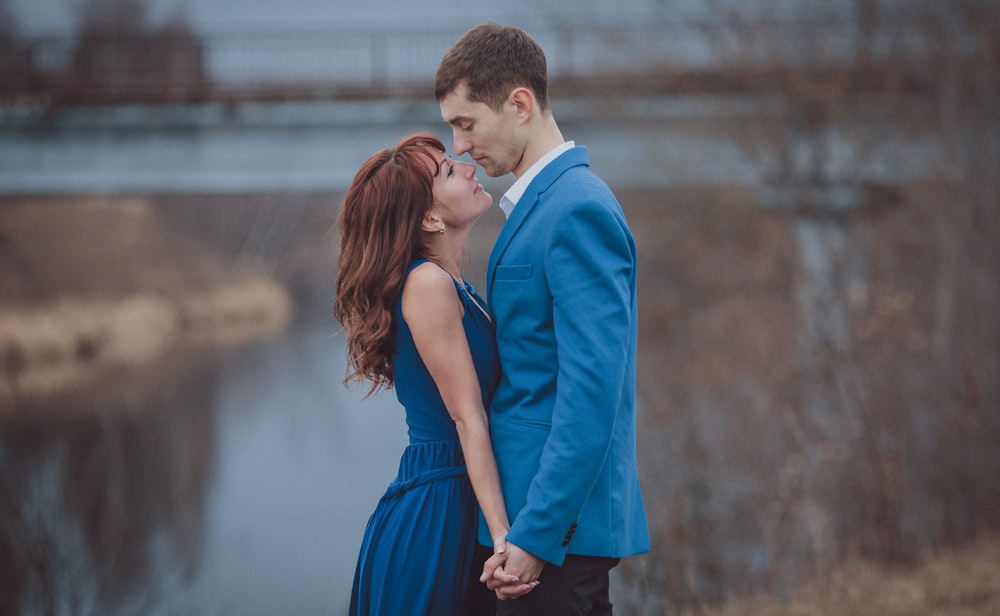 a man and woman kissing