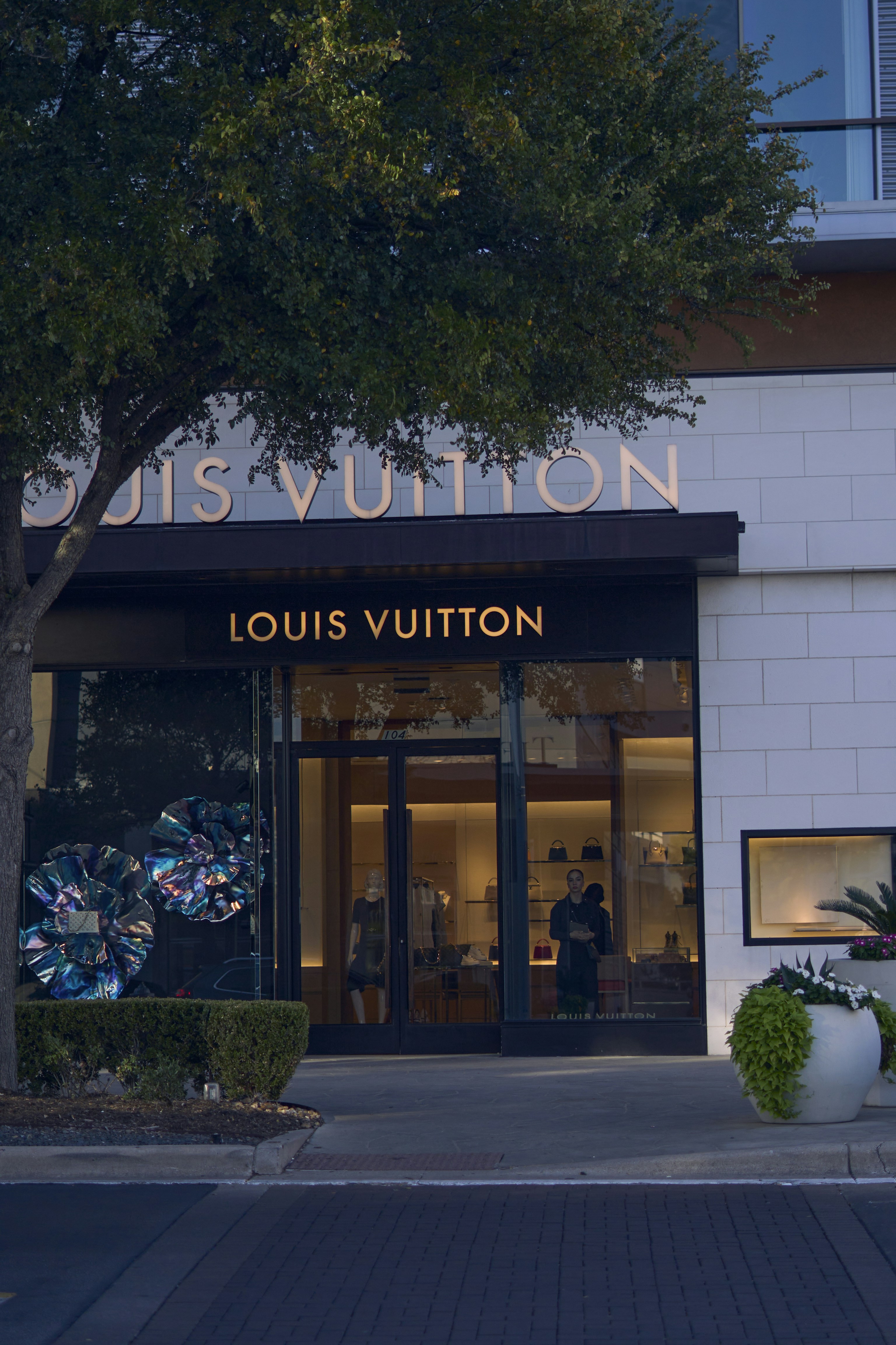 a building with a tree in the front