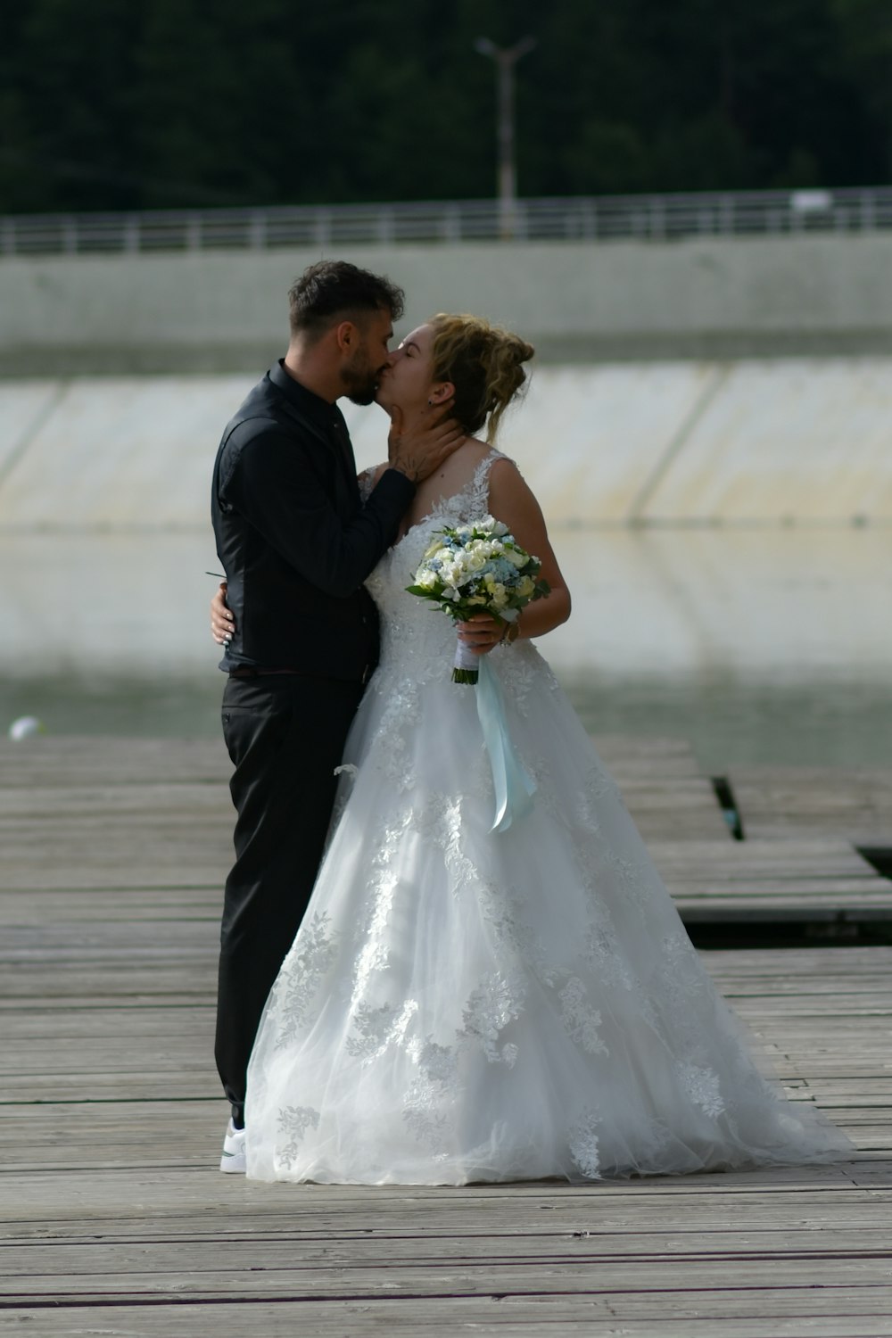 a man and woman kissing