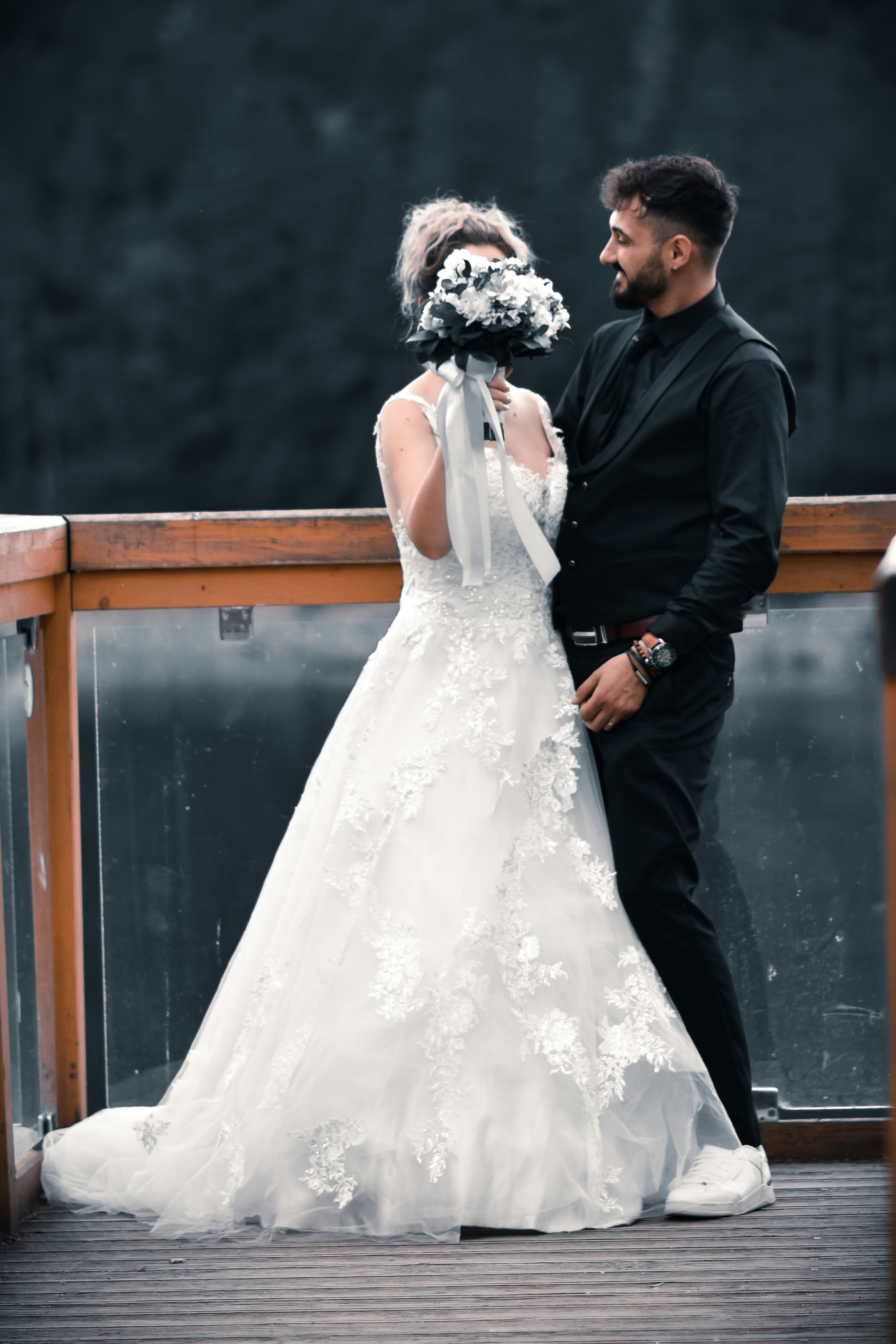 a man and woman in wedding attire