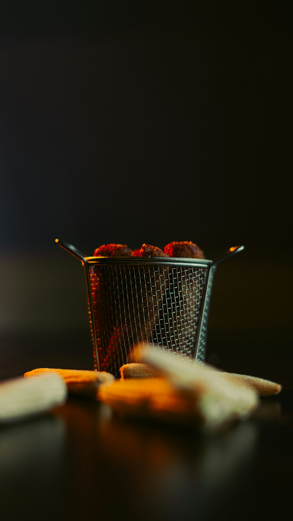 a glass cup with red liquid