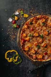 a pizza with cheese and toppings