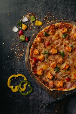 a pizza with cheese and toppings