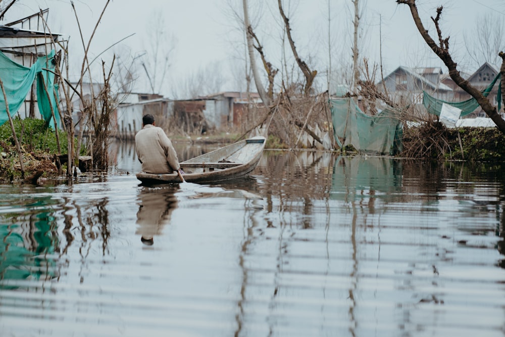 a person sitting in a boat