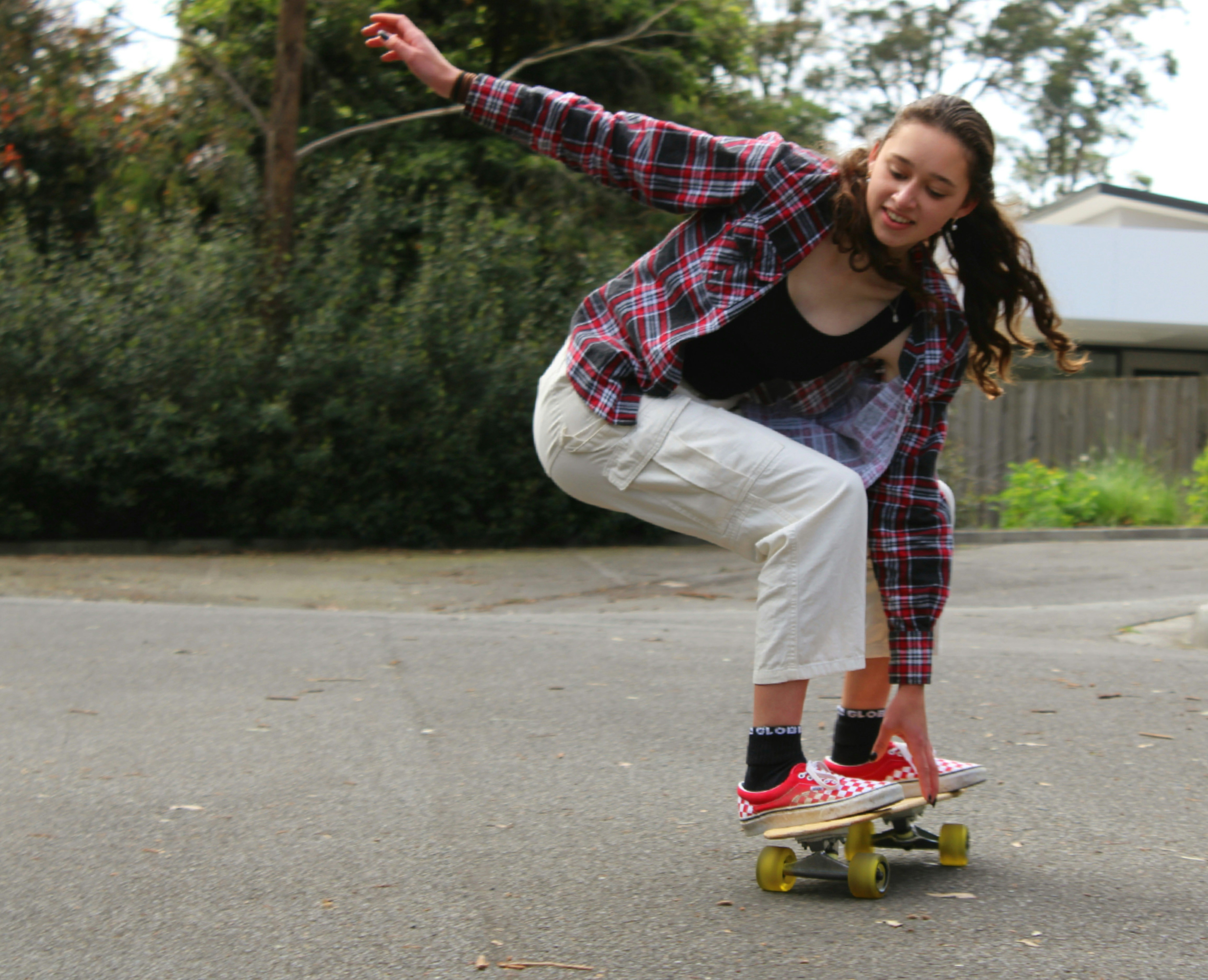 Skater girl doing trick