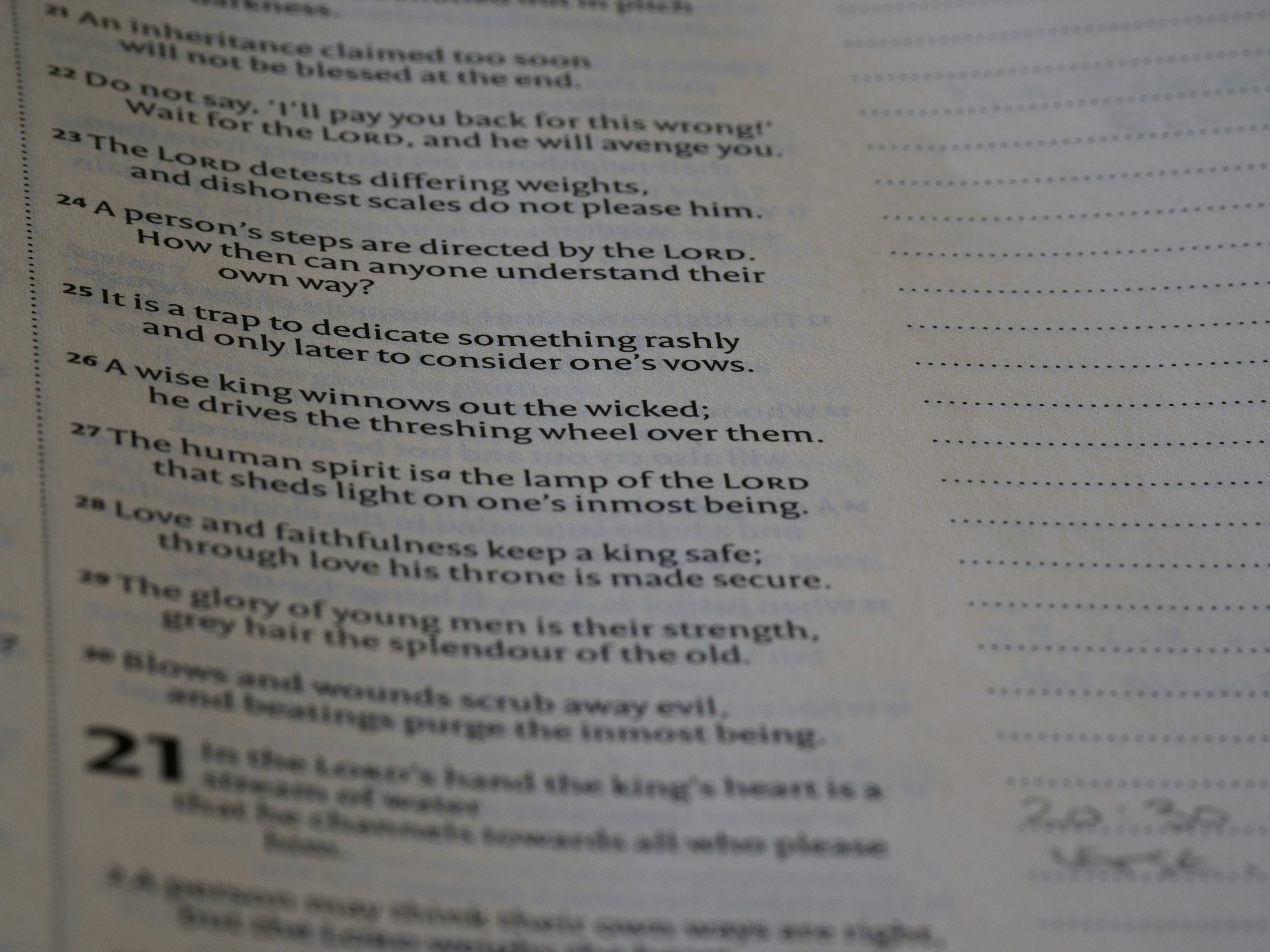 Close up of teacher grading papers