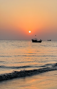 A serene sunset over a calm Caribbean sea, symbolizing peace and respectful passage.