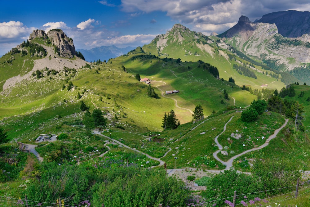 a winding road through a valley