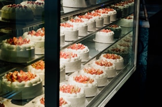a display case with different types of desserts