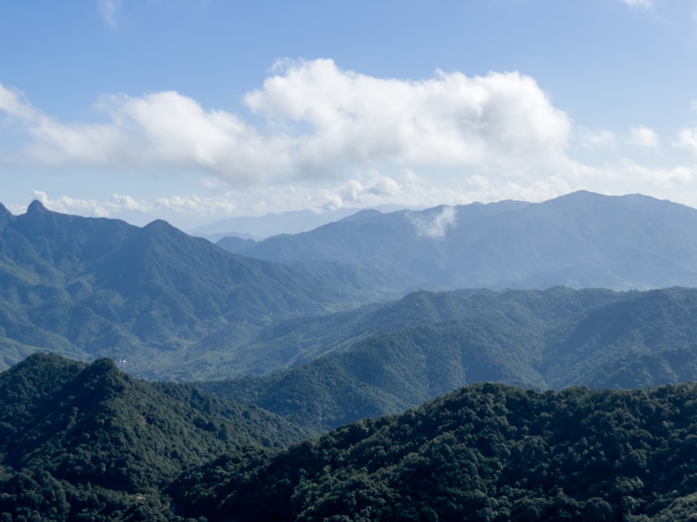 a landscape with mountains in the back