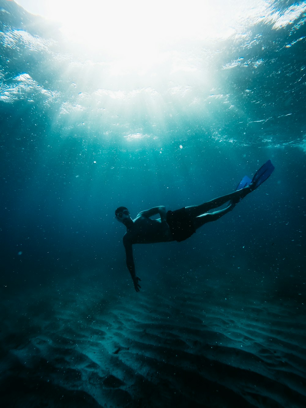 a man surfing in the sea