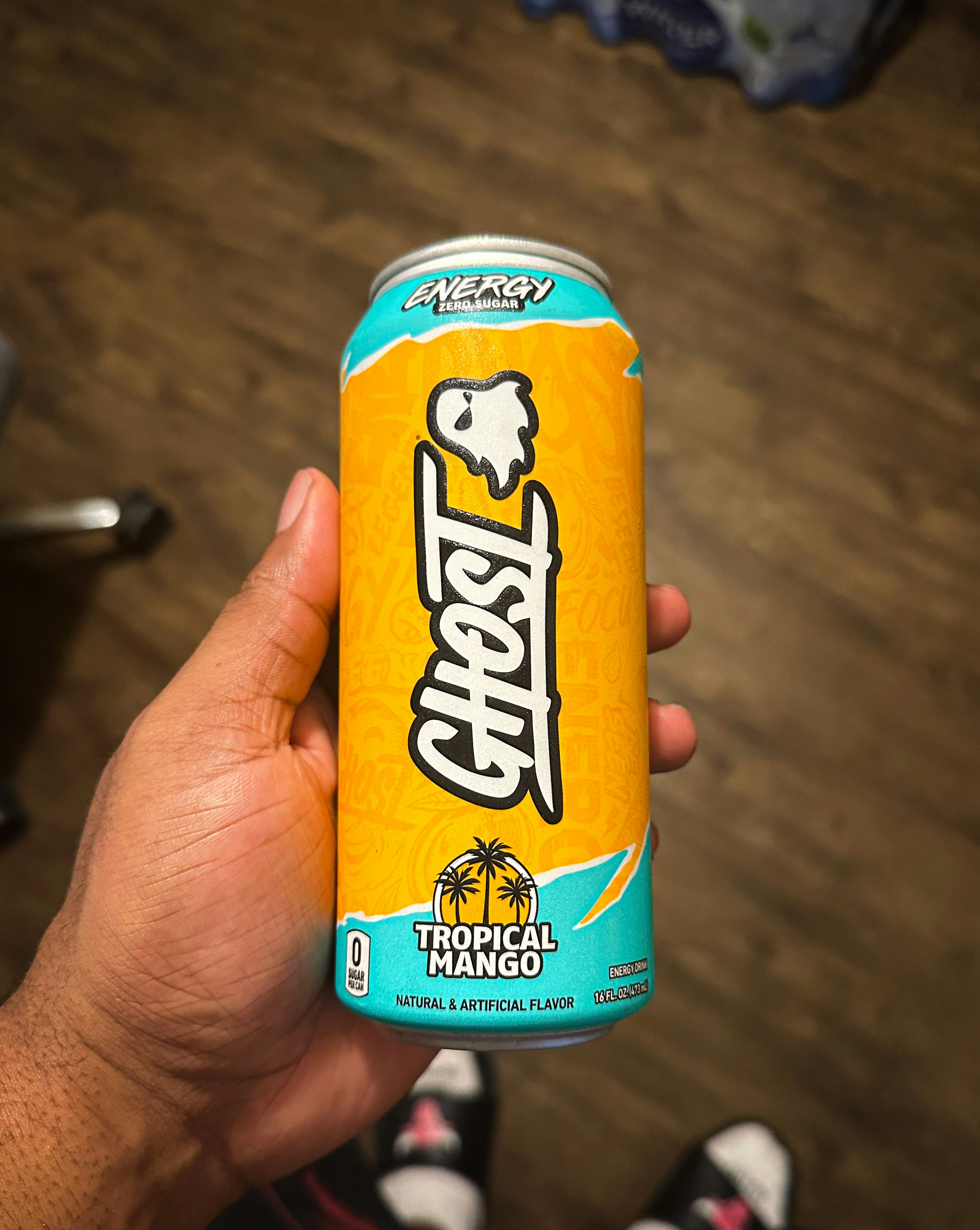 Ghost Energy drink can in tropical mango flavor with white design