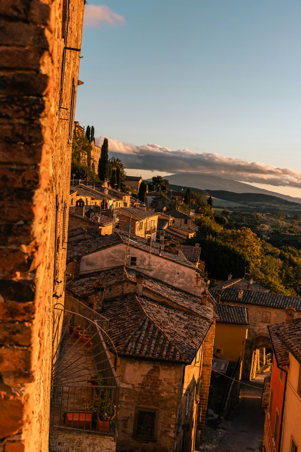 a view of a town from a stone wall