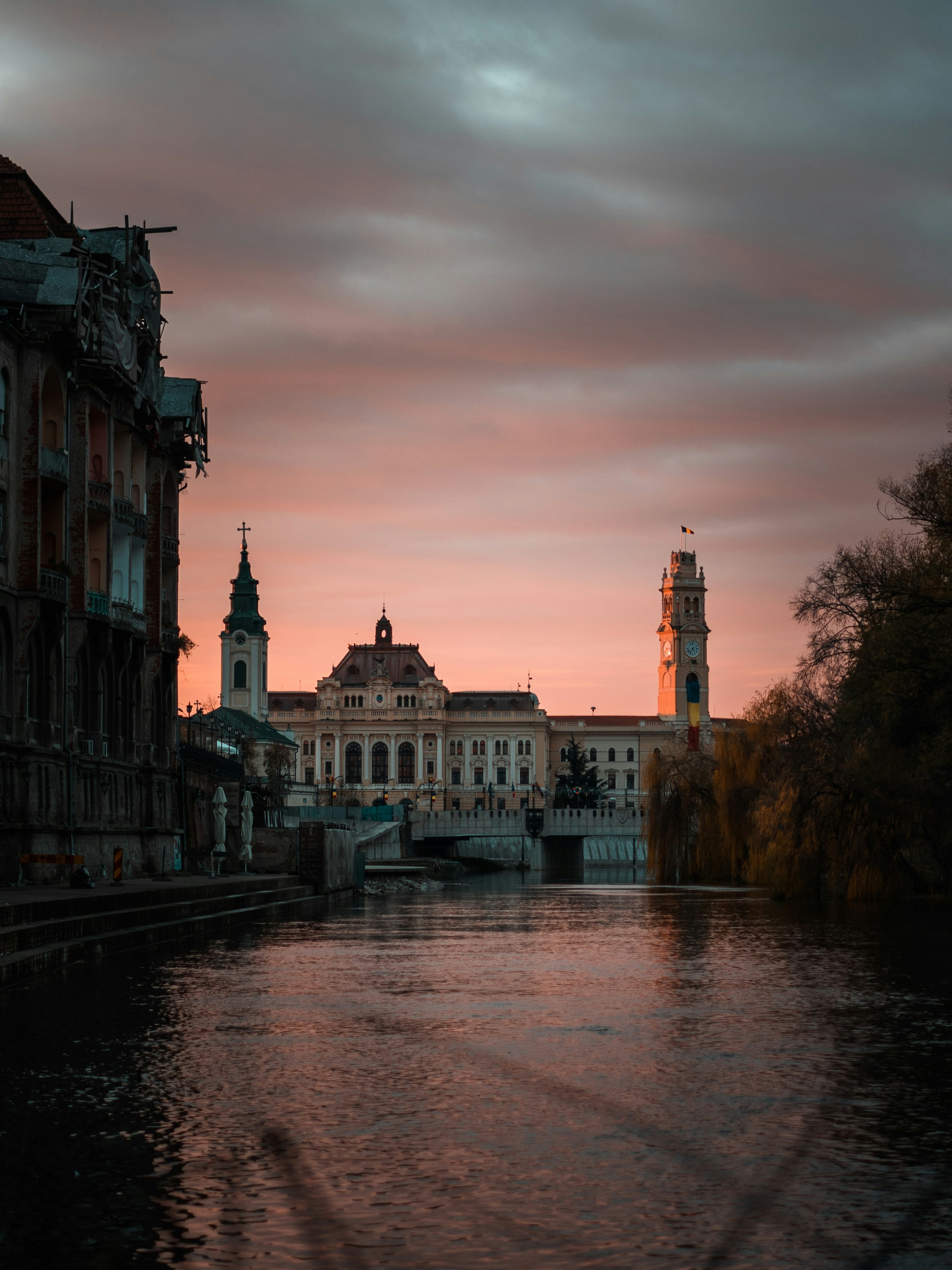 a river with buildings along it