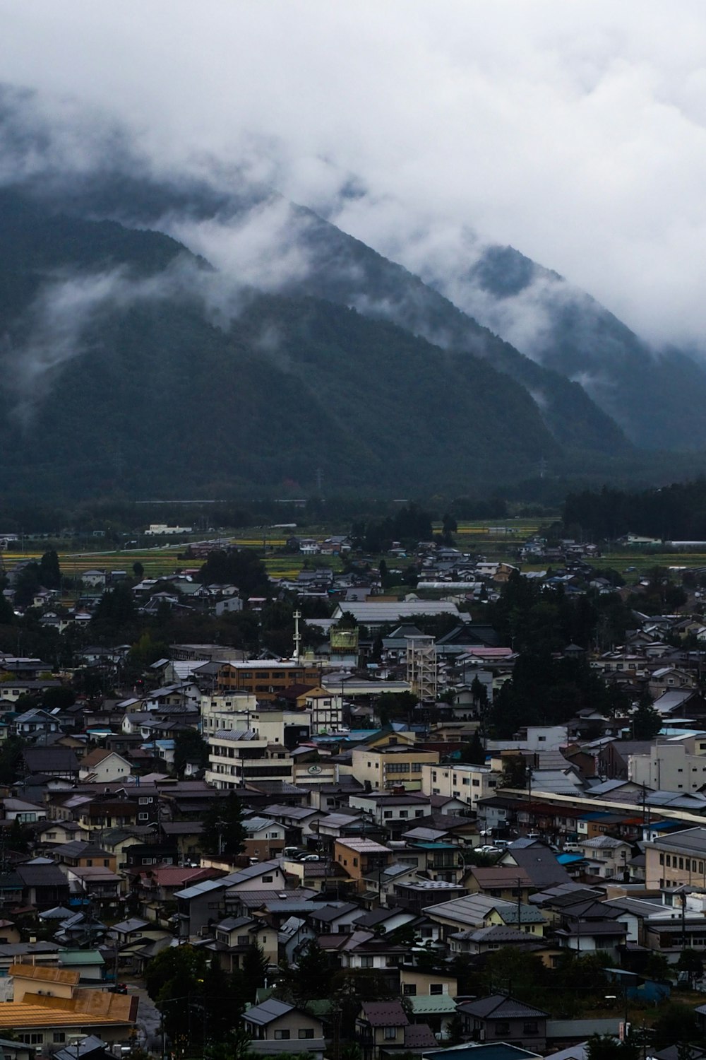 a city with a mountain in the background