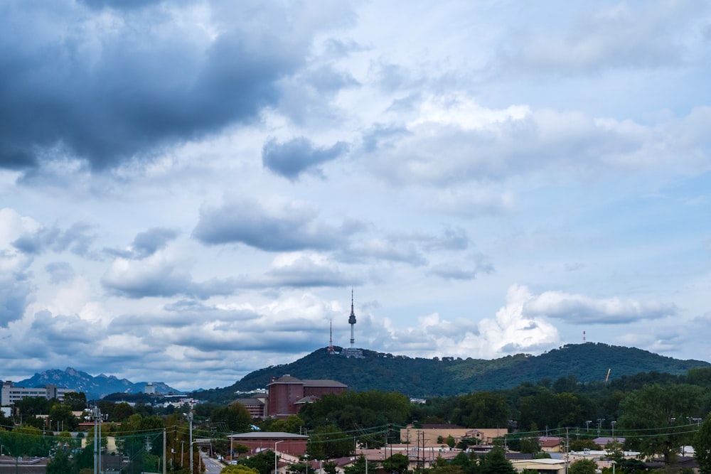 a city with a mountain in the background