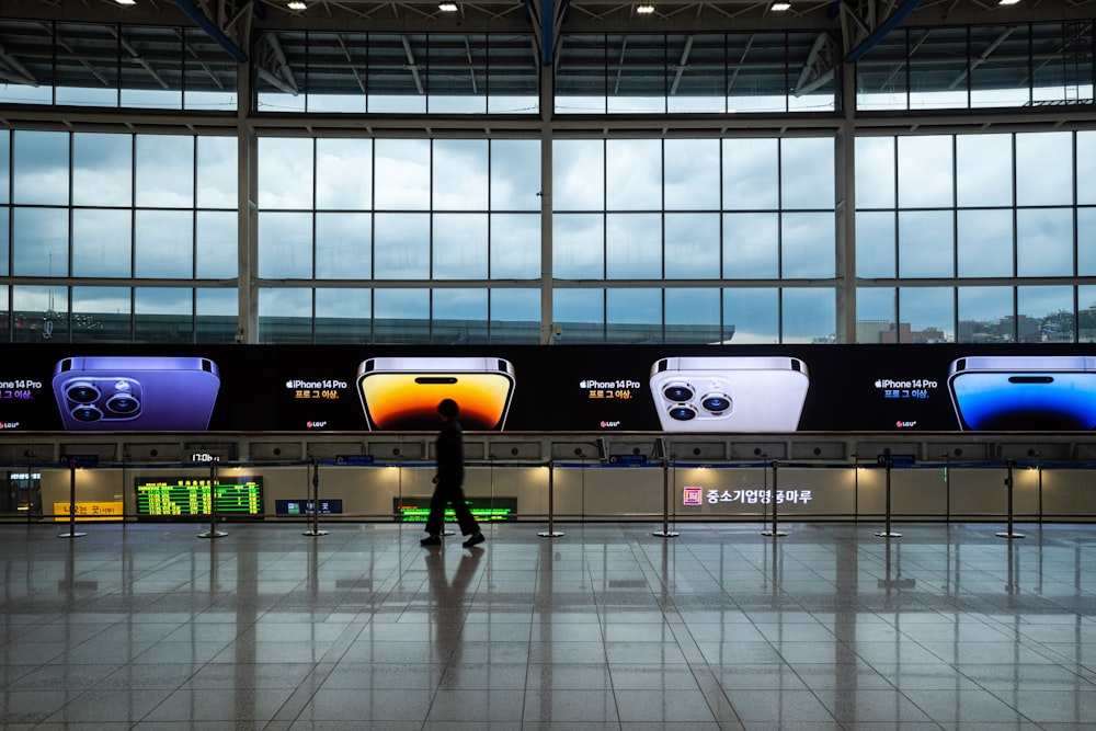 a person walking in a large airport