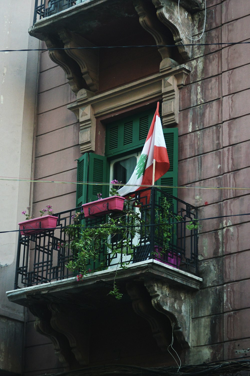 a flag on a balcony