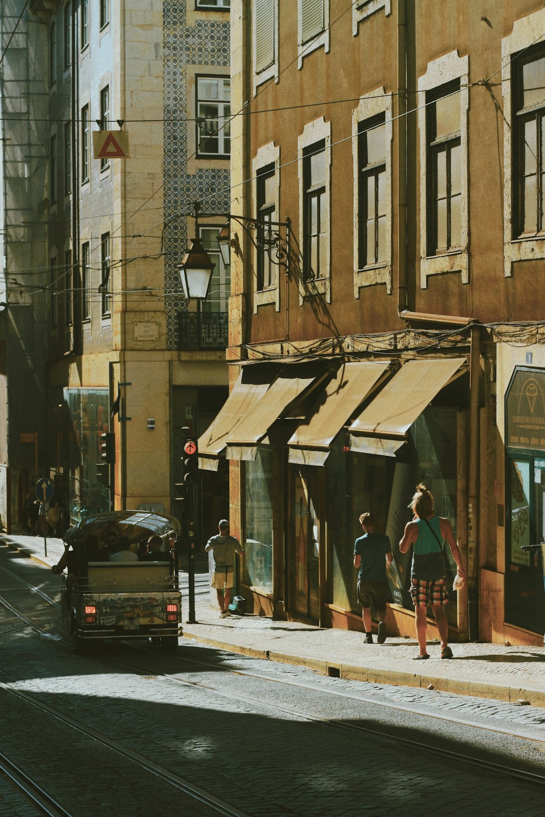 Person walking towards the sun