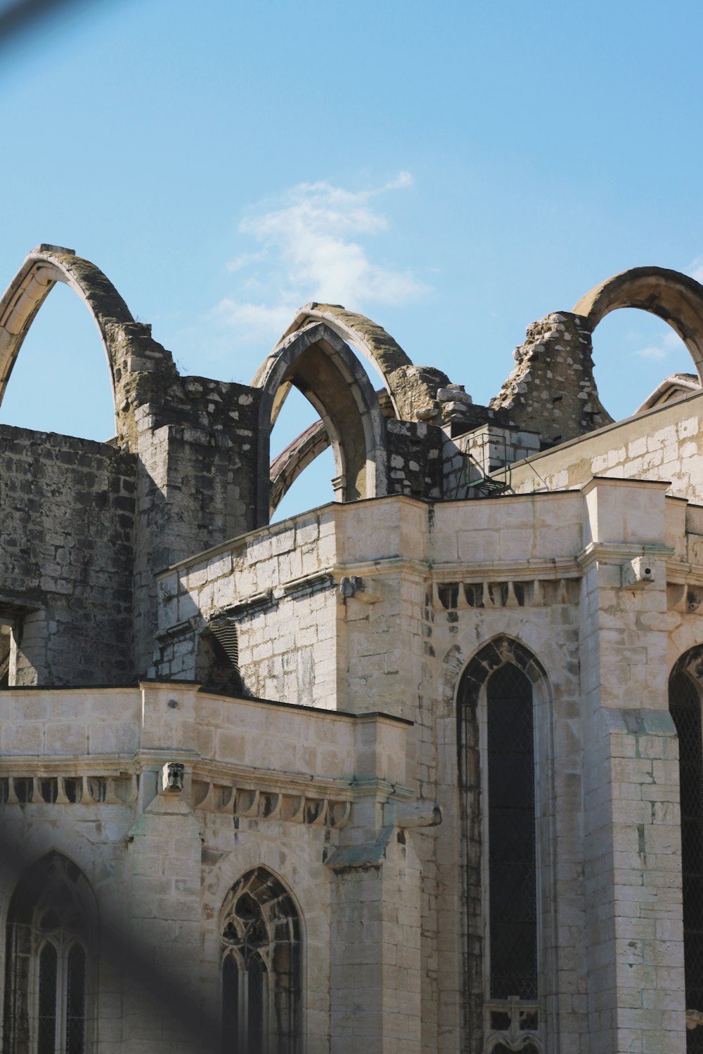 a stone building with arched windows