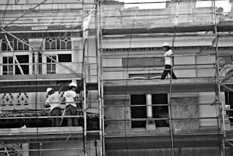 a group of men on a building