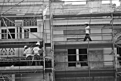a group of men on a building
