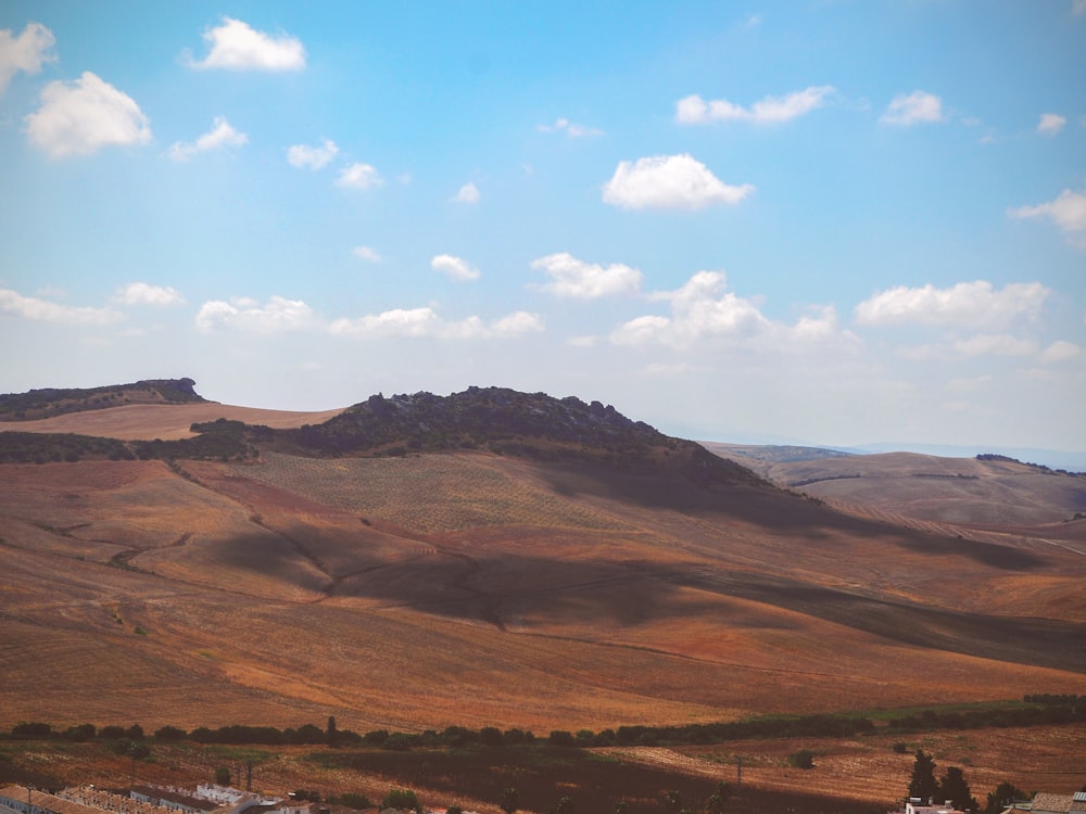 a landscape with hills and trees