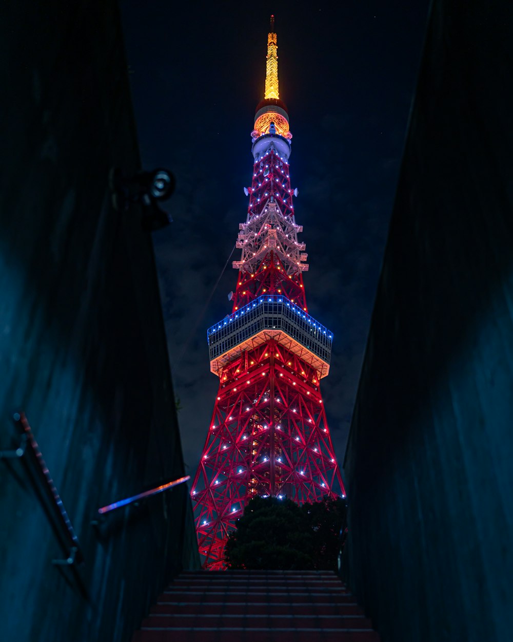 a tall tower lit up at night