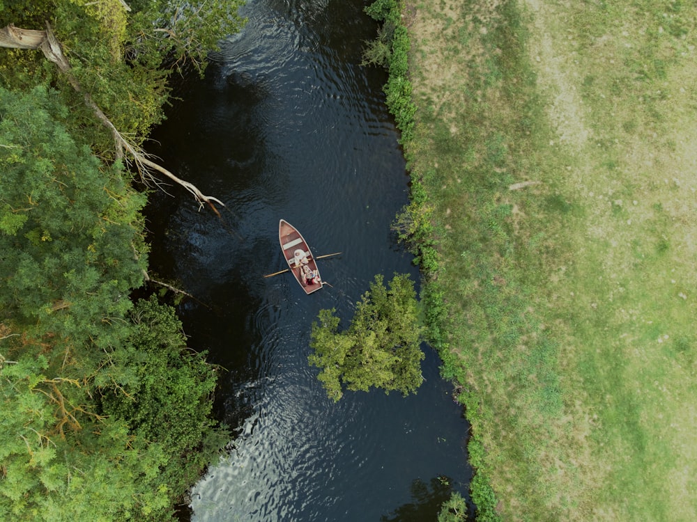 a person in a boat on a river