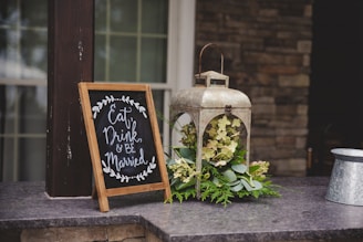 a sign next to a vase