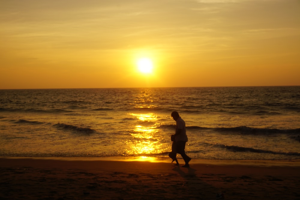 a person running on a beach