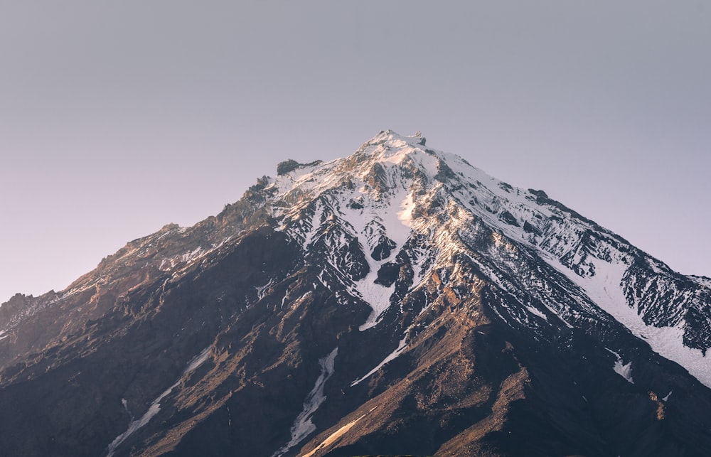 a mountain with snow