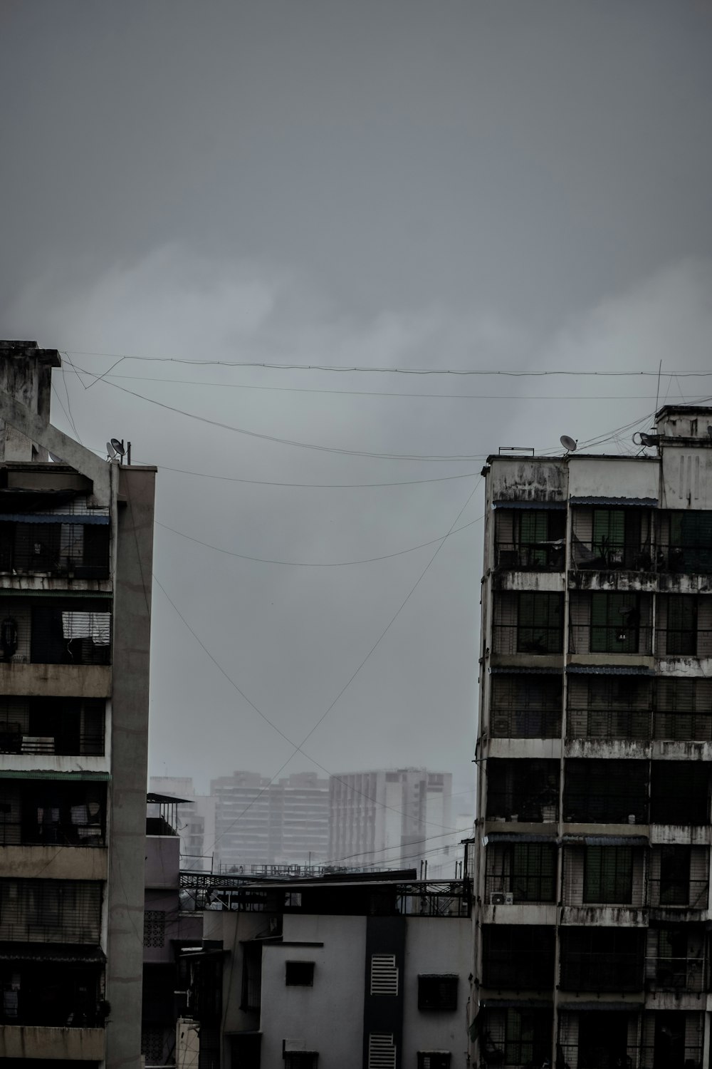 a group of buildings with wires