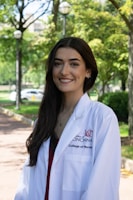 a person wearing a white coat