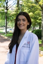 a person wearing a white coat