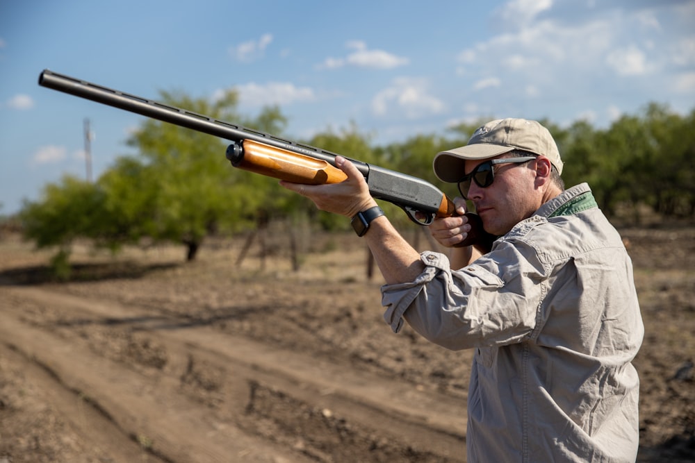 a man holding a gun