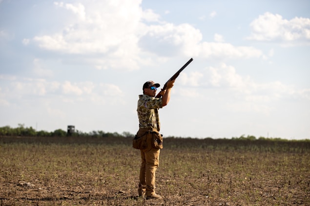 a man holding a gun