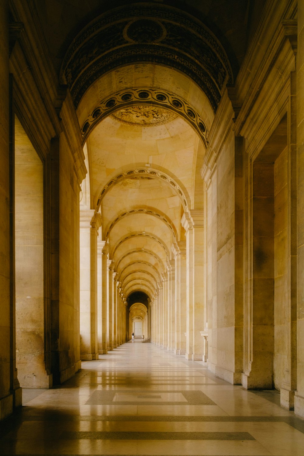 a hallway with arched ceilings