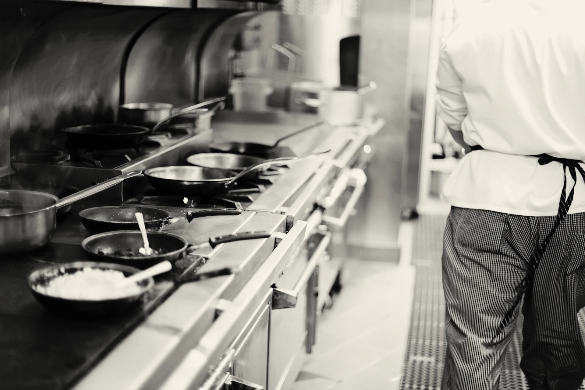 a chef cooking in a kitchen