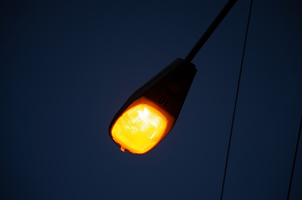 a lamp post with a bright light