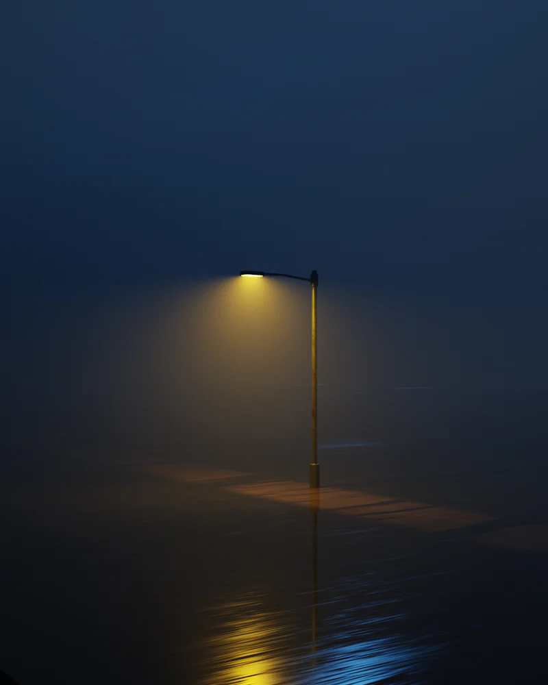 Street light glowing at night