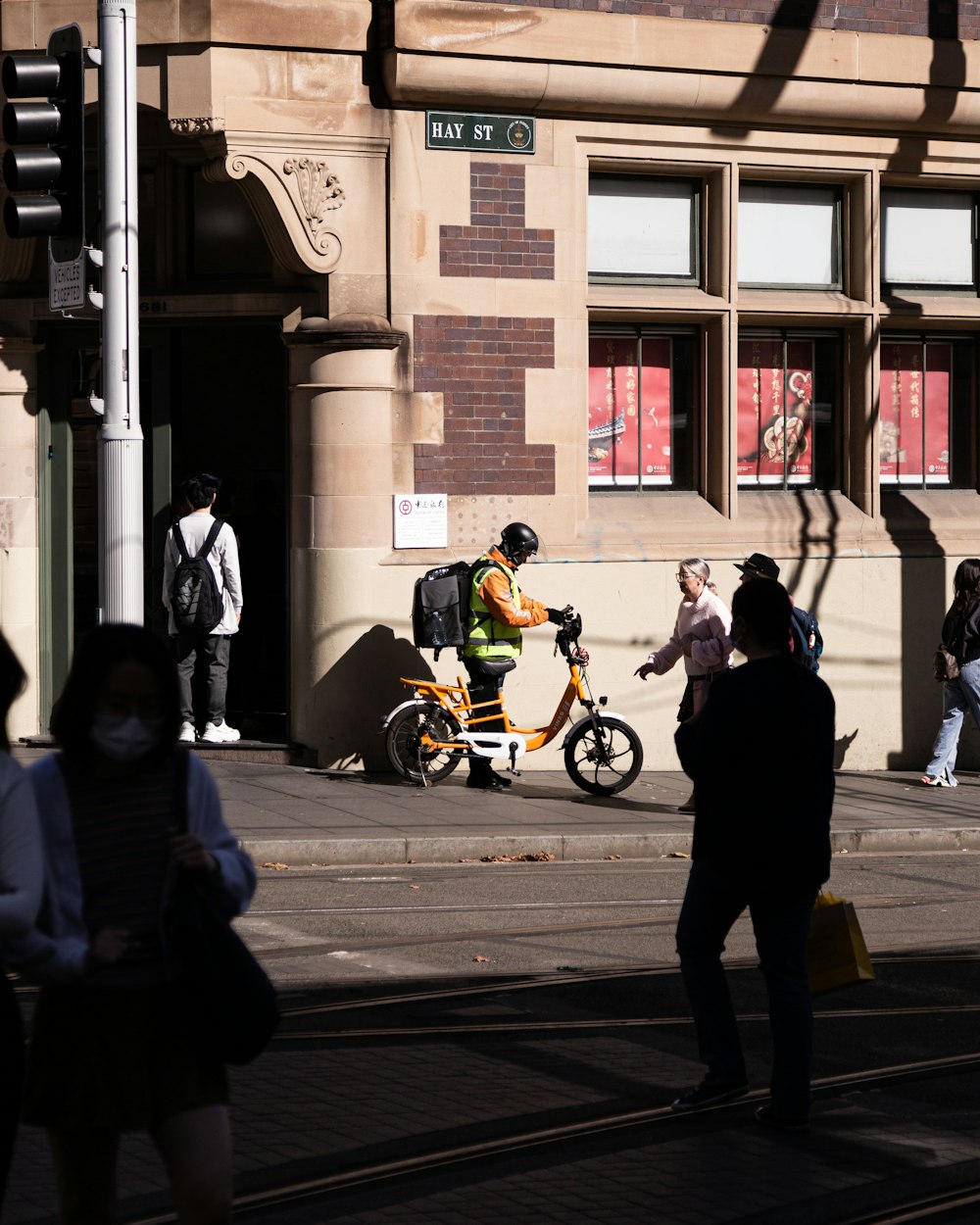 a person riding a bicycle on a street