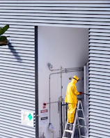 a person in a yellow jumpsuit