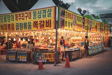 A lively street market in Seoul bustling with colorful stalls and local delicacies.