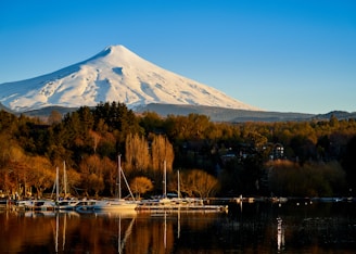 a mountain with a lake in front of it
