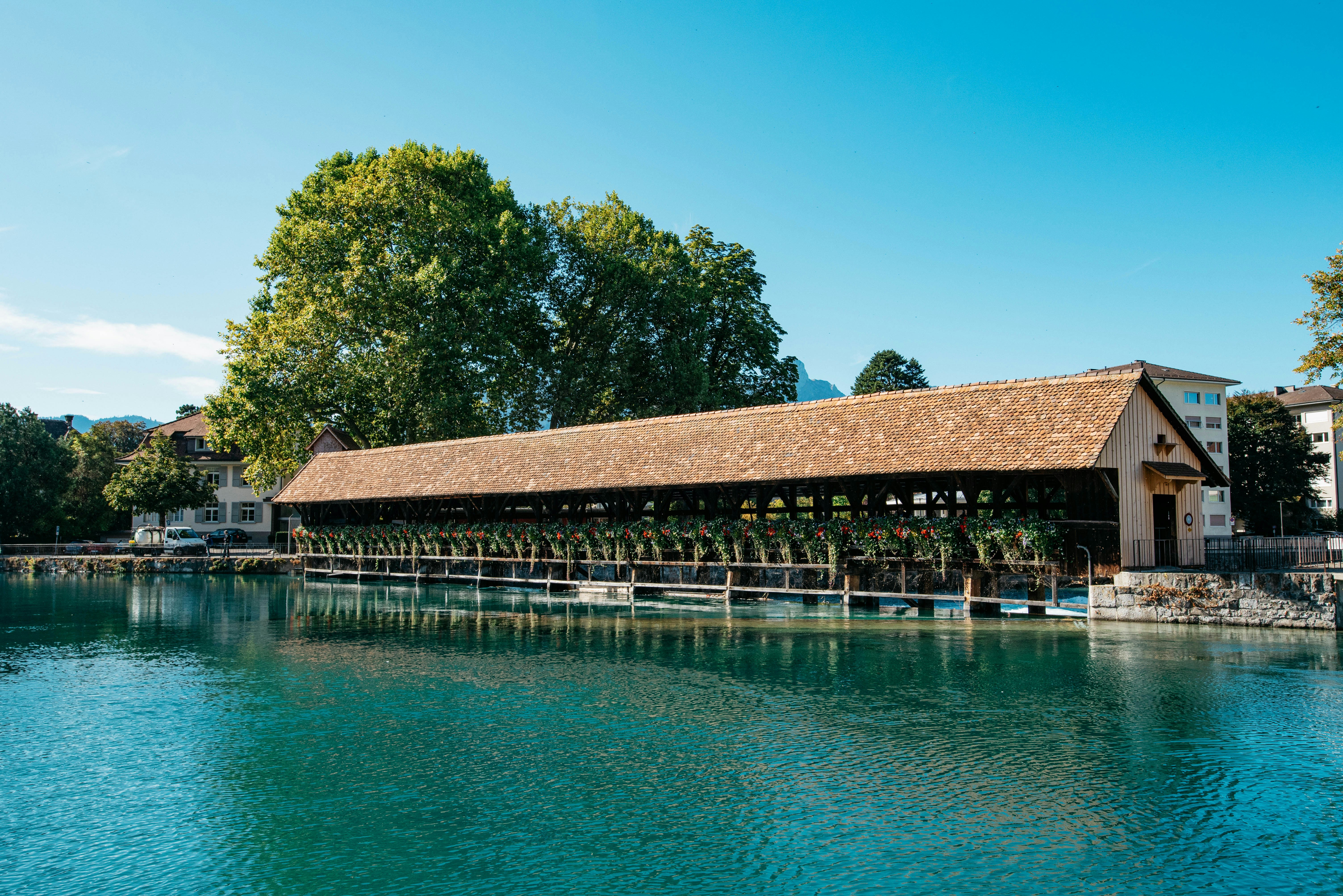 A building on the water photo – Free Water Image on Unsplash
