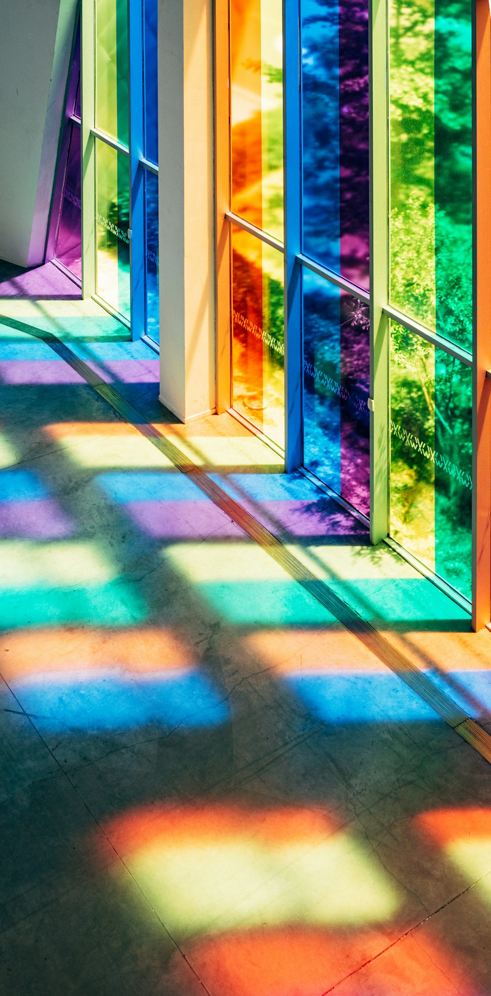 a hallway with glass doors