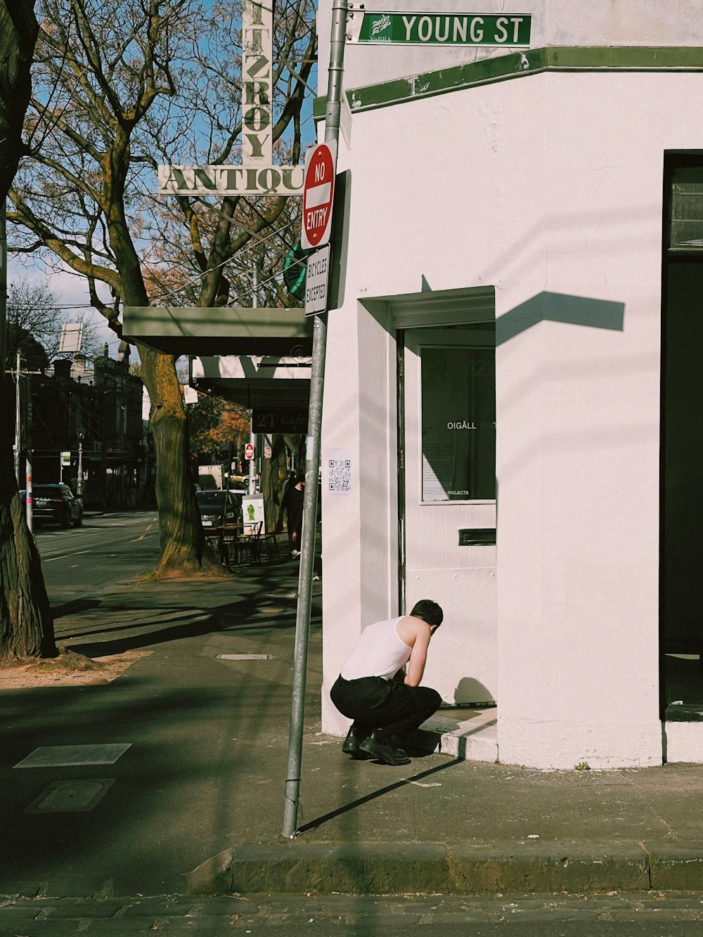 a man sitting on a bench