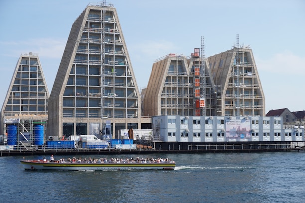 a boat in the water by a building