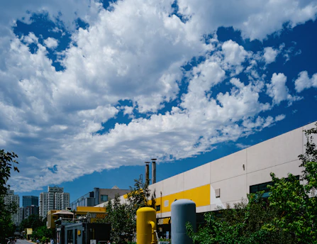 A vibrant cityscape showing residential and commercial buildings for sale.